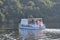 Large tour boat on trip along Norfolk Broads