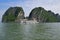 Large Tourist Junk Boat cruising without sail at Halong Bay