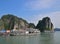 Large Tourist Junk Boats docking at Fishing Village in Halong Bay