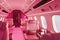 Large toy pink plane cabin. Air travel concept. Girls' holidays. Doll luxurious expensive lifestyle. Generative Ai