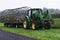 A large tractor with a cargo attachment