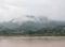 Large tranquil river in the valley of the high mountain.