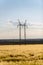 Large transmission tower with field