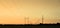 Large transmission towers at sunset