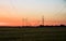 Large transmission towers at sunset