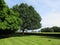 Large trees on farmhouse lawn