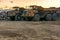 Large trucks in an open pit mine