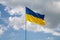 Large Ukrainian flag waving in the wind