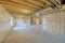 Large unfinished basement with woodframes and wall insulation