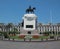 Large urban square with a monument to JosÃ© de San MartÃ­n, gardens