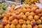 A large variety of fresh TROPICAL fruits on the counter of the grocery market