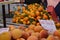 A large variety of fresh TROPICAL fruits on the counter of the grocery market