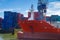 Large vessel and containers in Port of Rotterdam, Netherlands