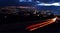 Large view  of lebanese shore  Beirut cityscape by night with  the red track lights of car on a foreground, Beirut Lebanon at dusk