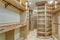 Large walk-in closet lined with built-in drawers