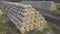 large warehouse of straw bales on the field.