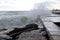 Large wave crashed against flood walls on a beach near Paphos, Cyprus. The sea awoke and showed its unpredictability and strength