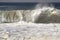 Large wave crashing in the ocean