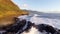 Large waves roll into the north west coast of Oahu