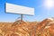 Large white billboard free from text on a cornfield on a background of blue sky and bright sun