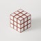 Large white cube made up of small white cubes with red edges on a white background