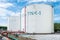 Large white industrial tanks for petrochemical or oil or fuel or water in refinery or power plant or industrail plant