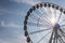 Large white observation wheel on Norfolk seaside town