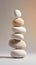 Large white pebbles stacked on top of each other, in the style of monochromatic palette