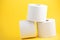 A large white toilet paper Roll for use in bathrooms or kitchens, used for cleaning dirt in the bathroom background