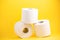 A large white toilet paper roll for use in bathrooms or kitchens, used for cleaning dirt in the bathroom background