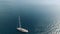 Large white yacht in open ocean, topview, aerial