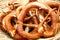 Large wicker basket and giant pretzels, close up