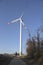 Large wind turbines with man. Production of clean and renewable energy. Trentino, Italy