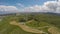 Large wind turbines standing in the fields, eco-friendly electricity generation