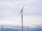 A large windmill in a wind farm