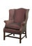 Large wing chair upholstered in red old antique isolated