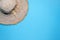 Large Woman straw hat on a blue background