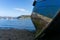 A large wooden boat wreck in the harbour of Portree