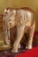 Large wooden elephants decorate with gold, carved in wood, most attractive souvenir for tourism from