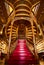 Large wooden staircase with red steps inside library bookstore Livraria Lello in historic center of Porto, famous for Harry Potter