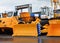 A large yellow excavator bucket. Construction machinery for sand transport. Dump truck