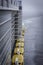 Large yellow lifeboat on side of cruise ship