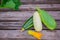 large zucchini lie on a wooden one