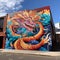 Larger-than-life mural of a mythical creature in Melbourne's laneway