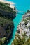 The largest European canyon Verdon Gorges with the view on the bridge and boats, pedalos on azure blue water , overlooking lake Sa