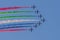 Largest Military Show at Marjan Island with coordinated military aircrafts showing the UAE flag colors on the bright blue sky