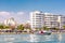 LARNACA, CYPRUS - AUGUST 27, 2016: Finikoudes Beach with the numerous hotels and cafes on the background