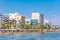 LARNACA, CYPRUS - AUGUST 27, 2016: Finikoudes Beach with the numerous hotels and cafes on the background