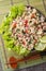 Larp or larb gai is a classic Thai Laos chicken salad, packed with delicious lemongrass, lime, cilantro and chili closeup on the