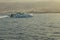 Las Americas, Tenerife, Spain - May 25, 2019: View to the coastline and small high-speed ferry from another ferry departing for